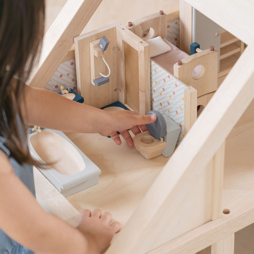 Kid playing PlanToys Bathroom - Orchard