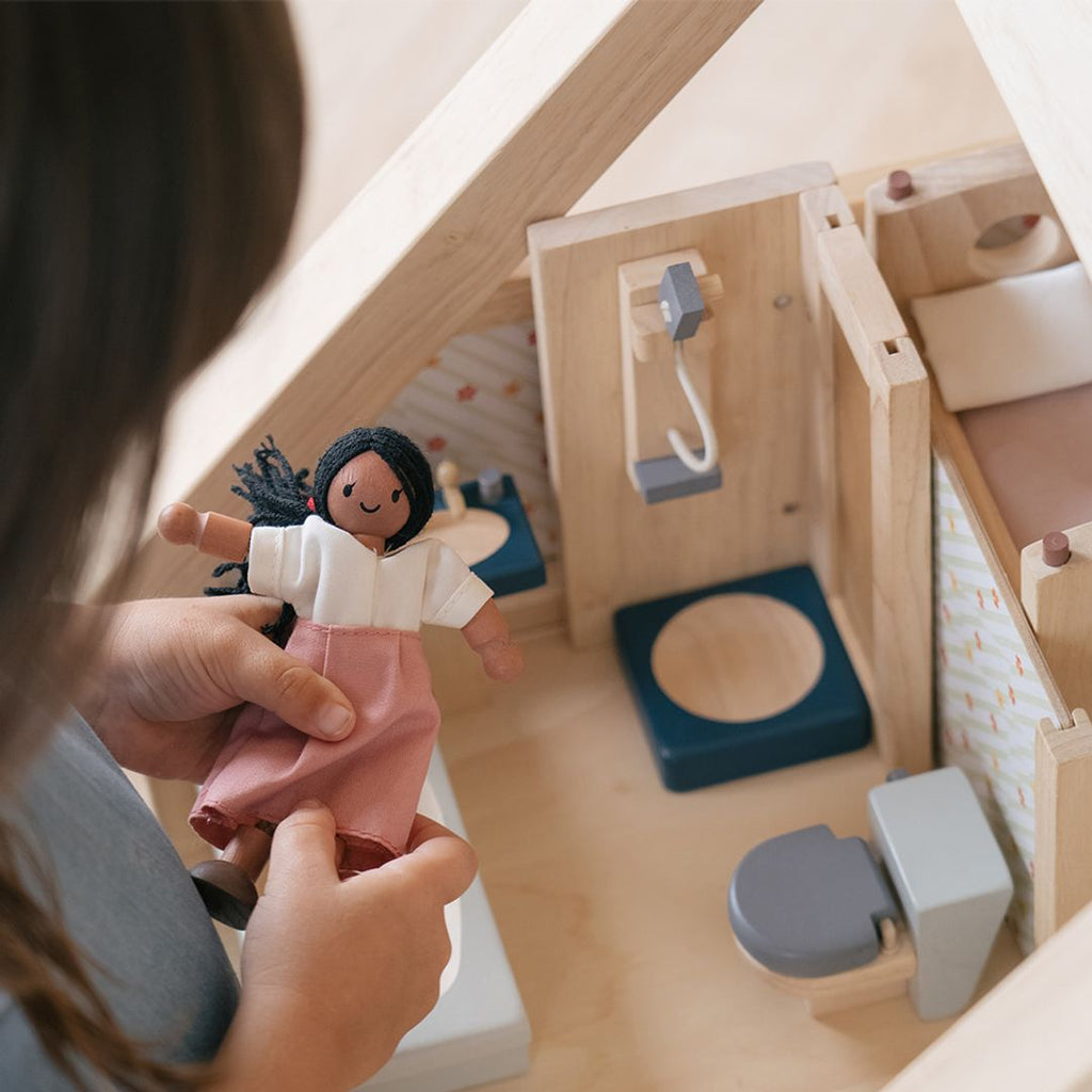 Kid playing PlanToys Bathroom - Orchard