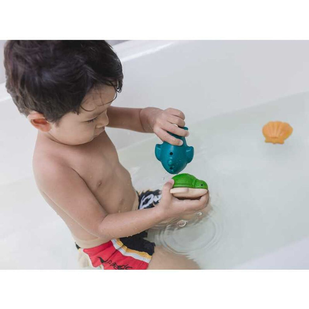 Kid playing PlanToys Sea Life Bath Set