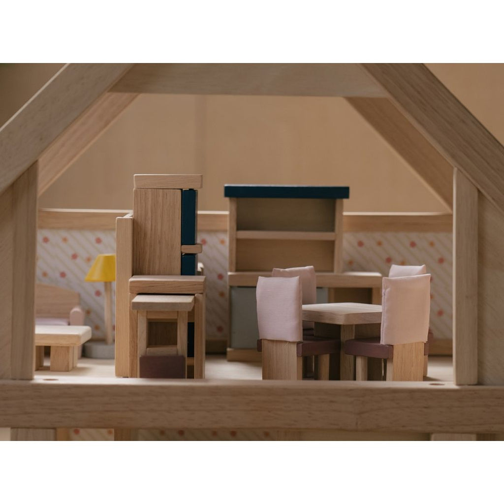 Kid playing PlanToys Dining Room - Orchard